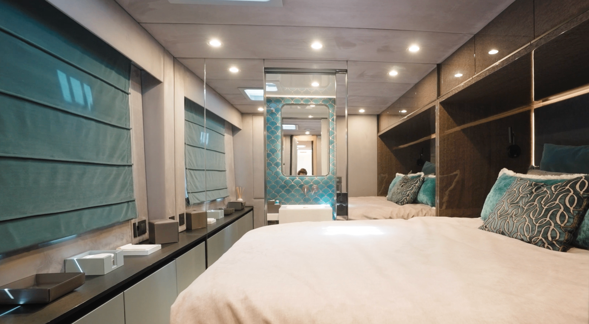 CATALLAXY master suite with teal accents and en suite